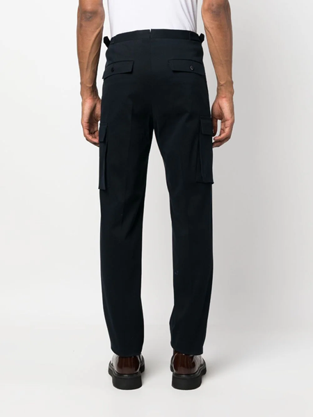 trousers with off-center pleats